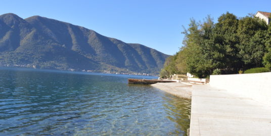 Urbanized plot on the coast line Kotor